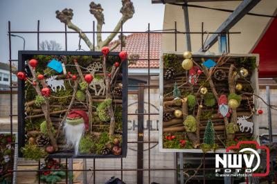 Molen De Tijd decor van kerstmarkt in Oostendorp, waar weer veel bezoekers op af kwamen. - © NWVFoto.nl