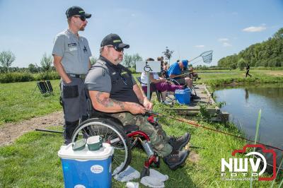 Forel rolstoel vissen bij H2O in Wezep. - © NWVFoto.nl
