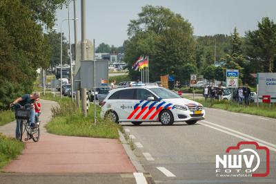 Lange file op de Flevoweg N309 door ongeval op de brug naar Flevoland, en festival gangers op weg naar LowLands . - © NWVFoto.nl