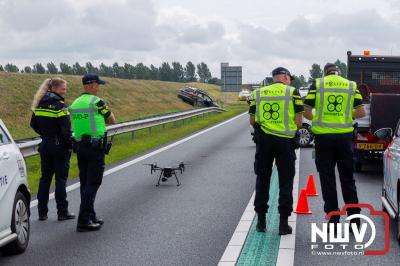 Vrachtwagenchauffeur kan geschaarde auto met aanhanger niet meer ontwijken, met drie zwaargewonden als gevolg. - © NWVFoto.nl